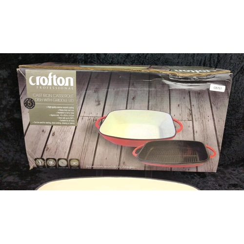 60 - Brand new (with box) red cast iron casserole dish with griddle lid, made by Crofton Professional.