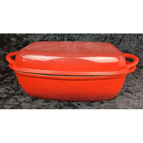 60 - Brand new (with box) red cast iron casserole dish with griddle lid, made by Crofton Professional.