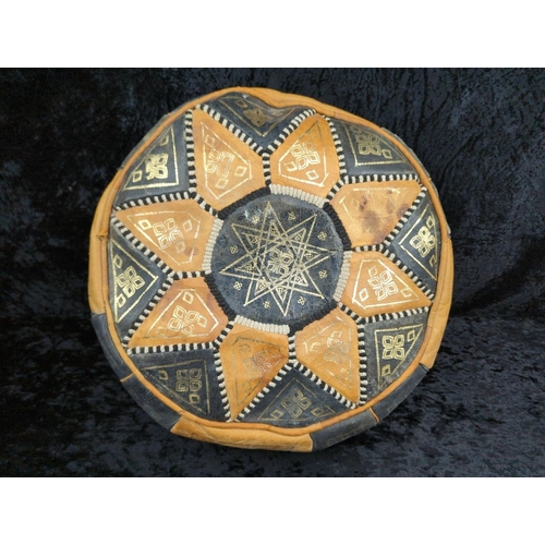69 - Vintage Moroccan leather pouffe/footstool with gold colour pattern - approx Dia42cm.