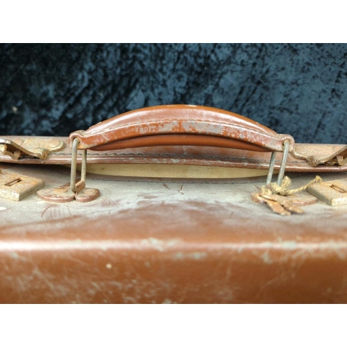 71 - Two vintage brown leather suitcases - largest by Revelation with remains of address labels to top, a... 