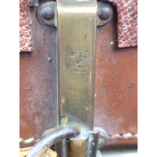 71 - Two vintage brown leather suitcases - largest by Revelation with remains of address labels to top, a... 