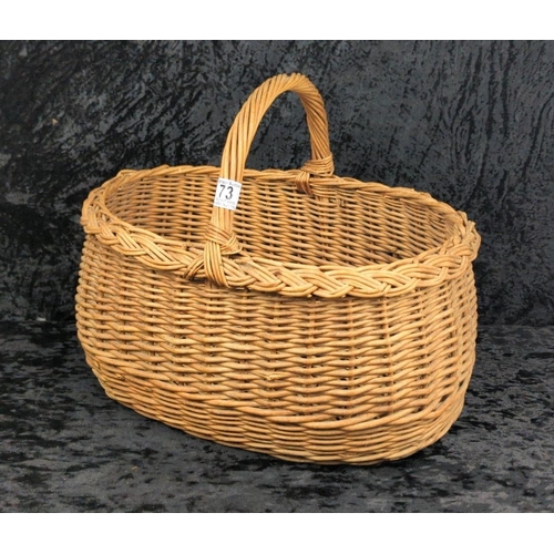 73 - Vintage oval wicker shopping basket - approx W42cm.