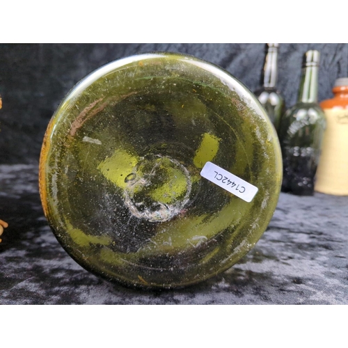 74 - Collection of vintage green glass bottles, stoneware flagons and bottles, plus an antique salt-glaze... 