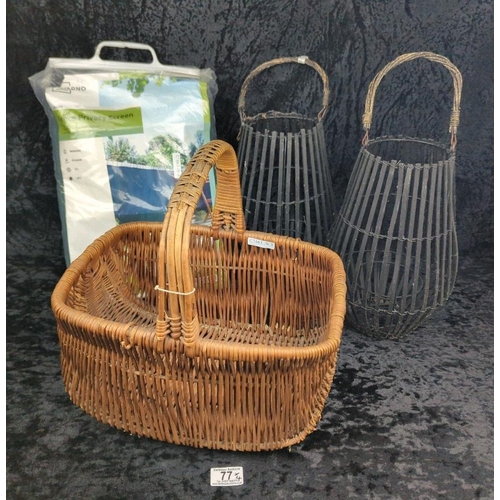 77 - Vintage wicker shopping basket, two rattan lanterns, and an unused fence privacy screen.