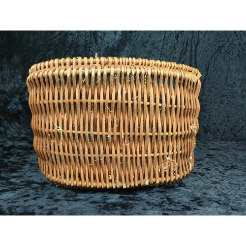 77 - Vintage wicker shopping basket, two rattan lanterns, and an unused fence privacy screen.