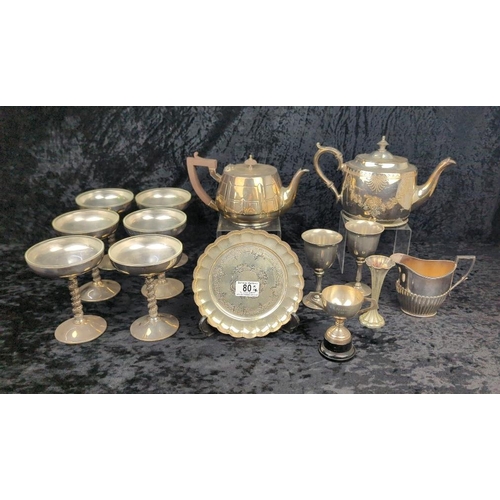 80 - Large collection of silver plate including teapots, and six coupes with plastic liners.