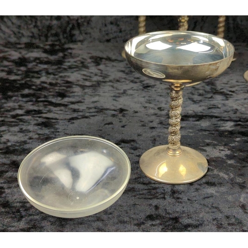 80 - Large collection of silver plate including teapots, and six coupes with plastic liners.