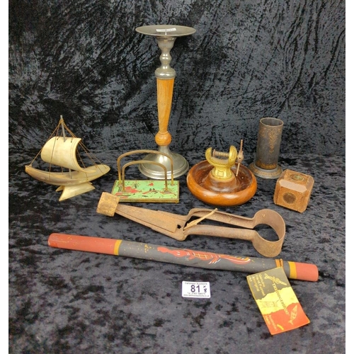 81 - Platypus lot of items including a chinoiserie letter rack, didgeridoo, quirky nutcracker and candles... 