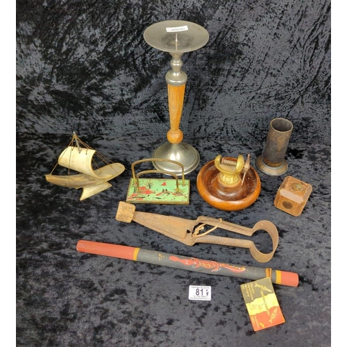 81 - Platypus lot of items including a chinoiserie letter rack, didgeridoo, quirky nutcracker and candles... 