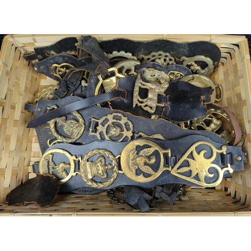 83 - Good selection of vintage horse brasses on leather straps.