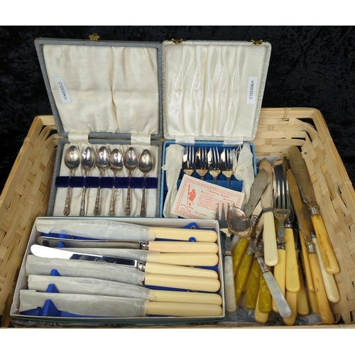 84 - Three vintage boxes of plated knives, spoons and cake forks plus loose cutlery.