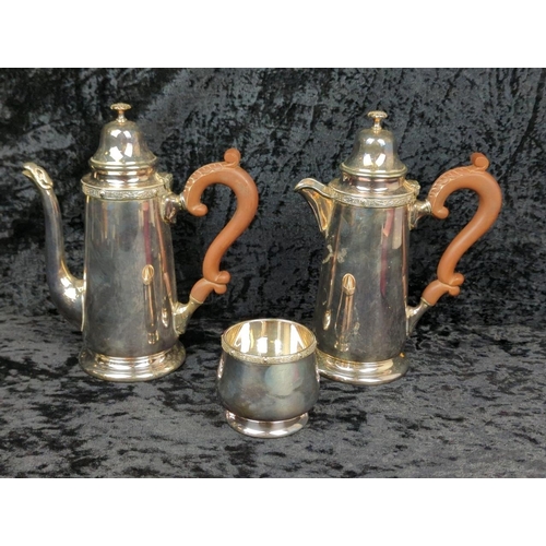 94 - Two Georgian-style English silver plate coffee pots with wooden handles, and a sugar bowl.