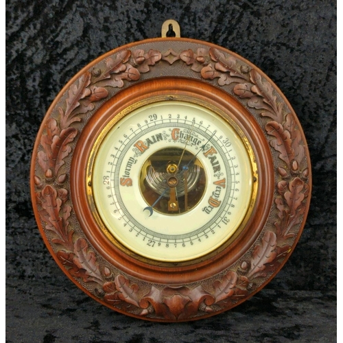1 - Antique carved wood aneroid barometer. Approx D24cm.