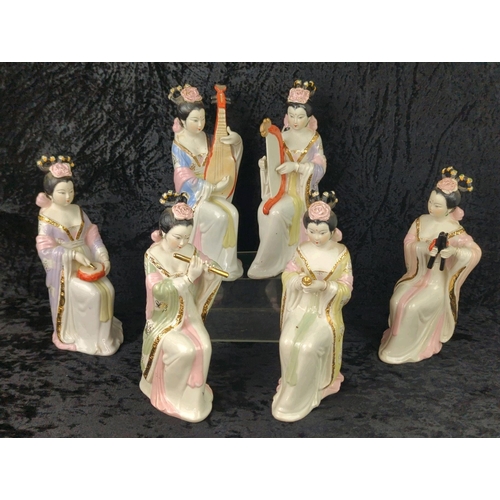 15 - Set of six Japanese glazed ceramic female figurines with bisque faces and hands. Each approx H25cm.