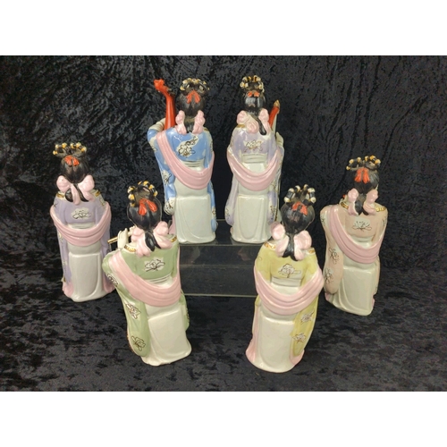 15 - Set of six Japanese glazed ceramic female figurines with bisque faces and hands. Each approx H25cm.