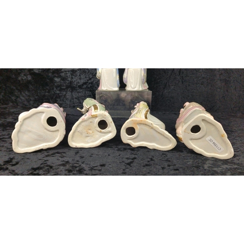 15 - Set of six Japanese glazed ceramic female figurines with bisque faces and hands. Each approx H25cm.