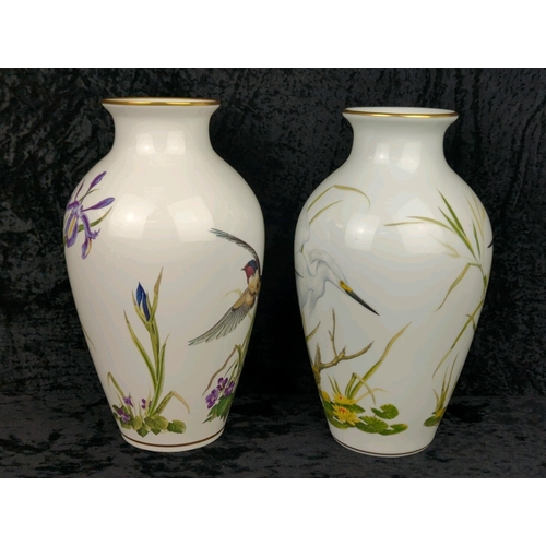 17 - Pair of Franklin Porcelain vases - ‘The Meadowland Bird Vase’ with a swallow and flowers and ‘The Ma... 