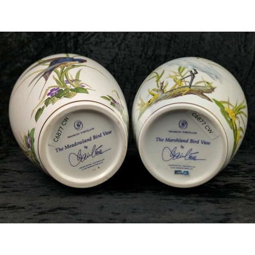 17 - Pair of Franklin Porcelain vases - ‘The Meadowland Bird Vase’ with a swallow and flowers and ‘The Ma... 