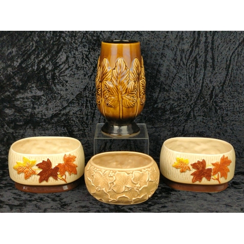 24 - Pair of vintage SylvaC planters with autumnal leaves design, along with a tall brown SylvaC vase and... 
