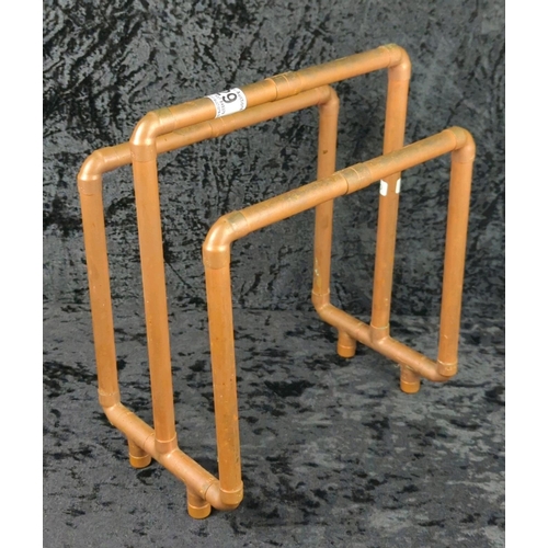 29 - Steampunk style magazine rack made from copper pipes. Approx H30 x W25cm.