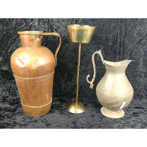 30 - Antique copper jug, with a pewter jug (handle needs fixing) and a heavy brass candlestick. Tallest a... 