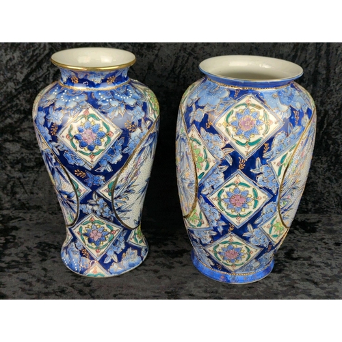 41 - Two large vintage ceramic vases with blue patterns and bamboo plants and gilt detailing. Marked Made... 