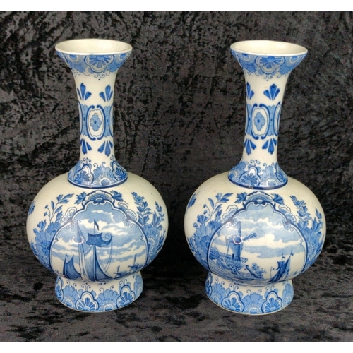 48 - Pair of old blue and white Delft ceramic vases. Each approx H25cm.