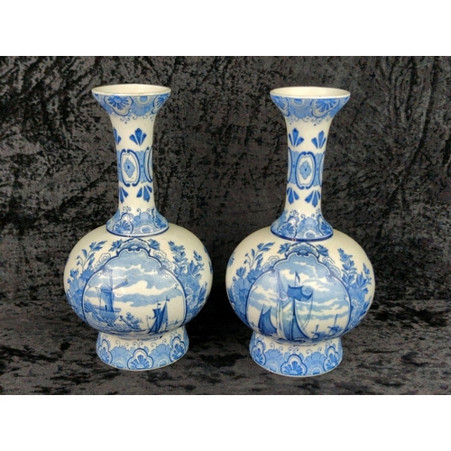 48 - Pair of old blue and white Delft ceramic vases. Each approx H25cm.