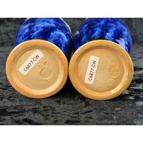 49 - Pair of early 20th century Royal Doulton vases with deep blue glaze and white relief flowers. Each a... 