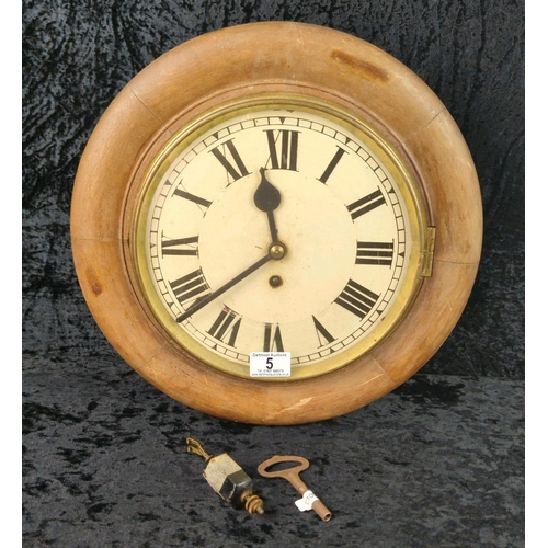 5 - Large antique wooden school or station wall clock, with key and in working order. Approx D37cm.