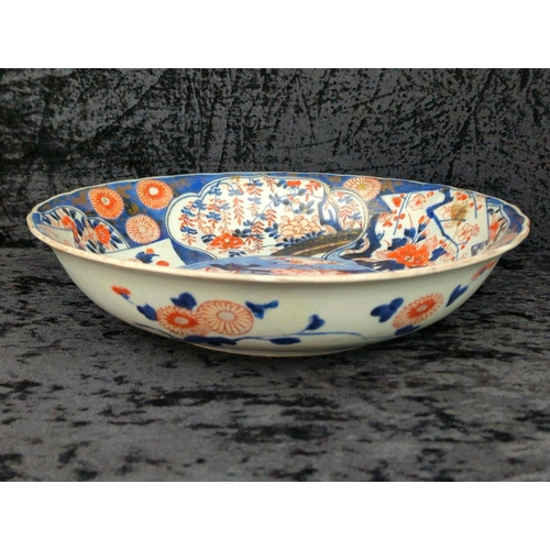 51A - Large antique 18th century Edo-period Japanese Imari porcelain charger bowl, with distinctive spur m... 
