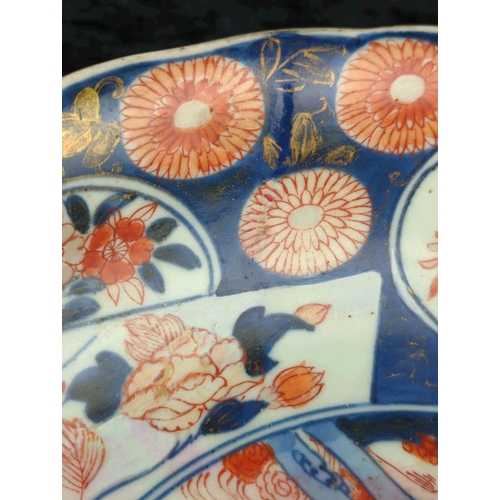 51A - Large antique 18th century Edo-period Japanese Imari porcelain charger bowl, with distinctive spur m... 