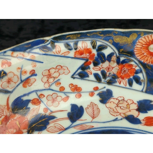 51A - Large antique 18th century Edo-period Japanese Imari porcelain charger bowl, with distinctive spur m... 