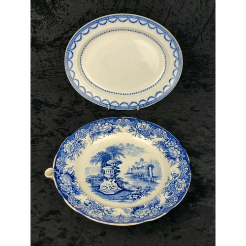 52 - Antique English flow blue transferware plate warmer (crack/repair to rim) and a small serving platte... 