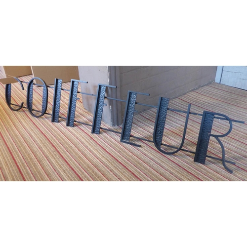132 - COIFFURE SIGN, 20th century French metal, 160cm L.