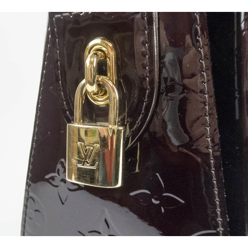 391 - LOUIS VUITTON MELROSE BAG, monogram patent leather, goldtone hardware, buckle details at handles, bo... 