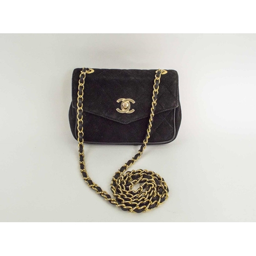 391a - CHANEL VINTAGE SHOULDER/CROSSBODY BAG, iconic diamond quilted black suede with matching leather inte... 