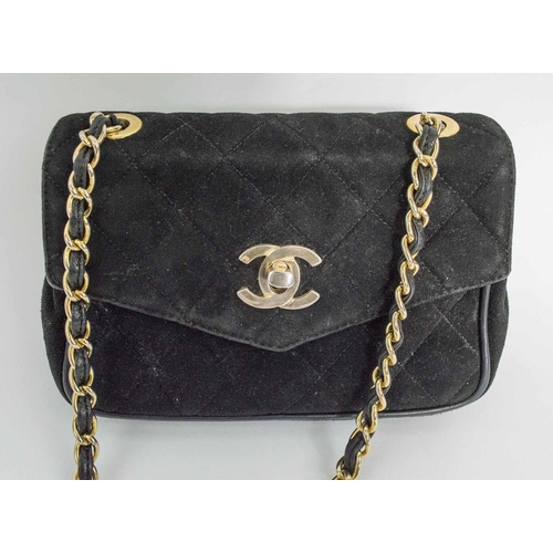 391a - CHANEL VINTAGE SHOULDER/CROSSBODY BAG, iconic diamond quilted black suede with matching leather inte... 