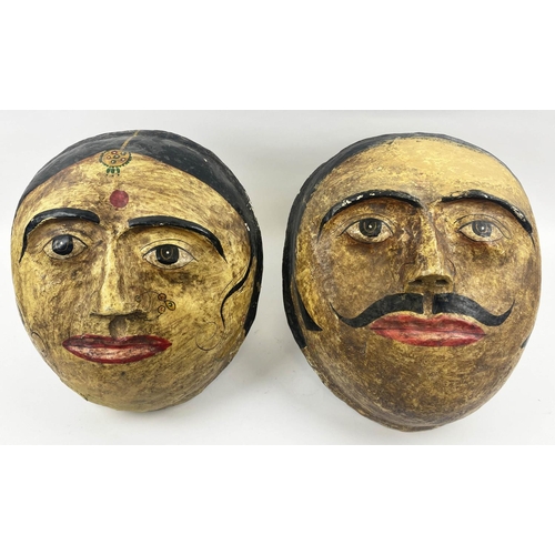 404 - INDIAN WALL MASKS, two, vintage hand painted papier-mâché, largest 43cm x 36cm. (2) (with faults)