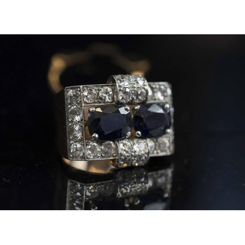 420 - COCKTAIL RING, Art Deco sapphire and diamond of architectural design set with two larger sapphires a... 