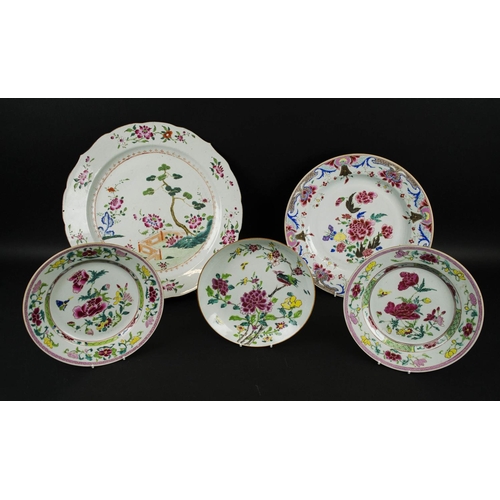 691 - CHINESE FAMILLE ROSE PORCELAIN PLATES, a pair, Qianlong, decorated with a spray of peony flowers to ... 