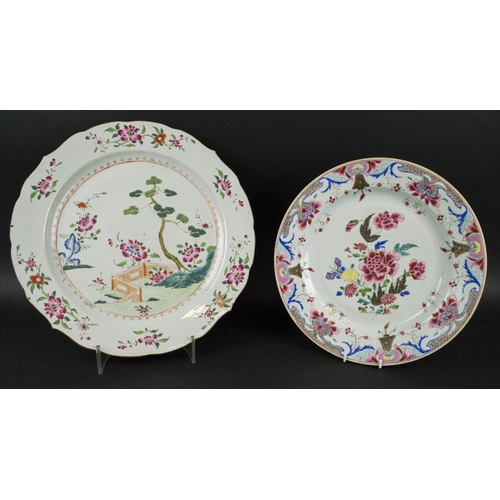 691 - CHINESE FAMILLE ROSE PORCELAIN PLATES, a pair, Qianlong, decorated with a spray of peony flowers to ... 