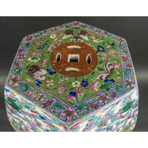 692 - CHINESE CERAMIC HEXAGONAL GARDEN SEAT, 19th/20th century with pierced double cash motifs bands of ra... 