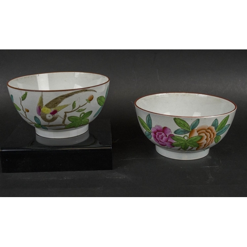 693 - BOWLS, a pair, 18th/19th century cream ware, possibly Spode, decorated with perched bird and bright ... 