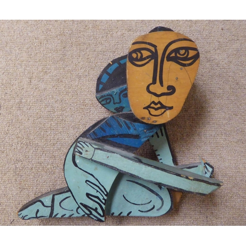 164 - STEFAN ROLOFF (German 1953), painted wooden figurine, 30cm x 27cm x 12cm.