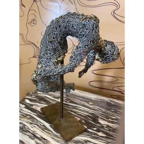 165 - FRENCH SCHOOL 'Crouching and Stretched Figures', metallic wire sculptures, a pair, one with monogram... 