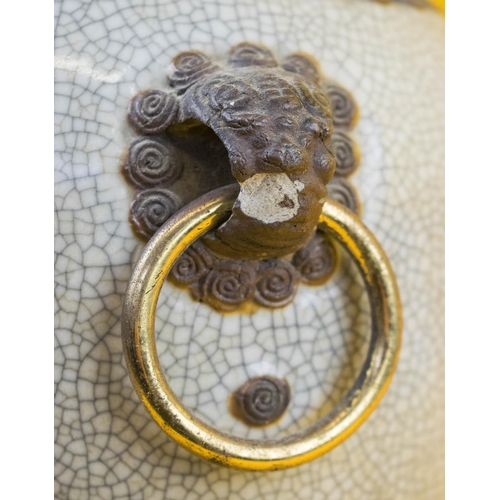 565 - TABLE LAMP, Chinese ceramic of vase form with brass rings and hardwood stand. (slight faults)