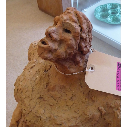 166 - SRI LANKAN SCHOOL 'Veiled Figure', terracotta sculpture, 54cm x 24cm x 24cm.