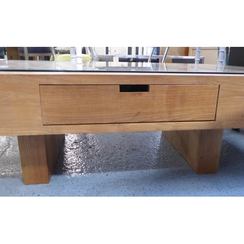 4 - LOW TABLE, contemporary design, with various drawers and a glass top, 127cm x 76cm x 36.5cm.