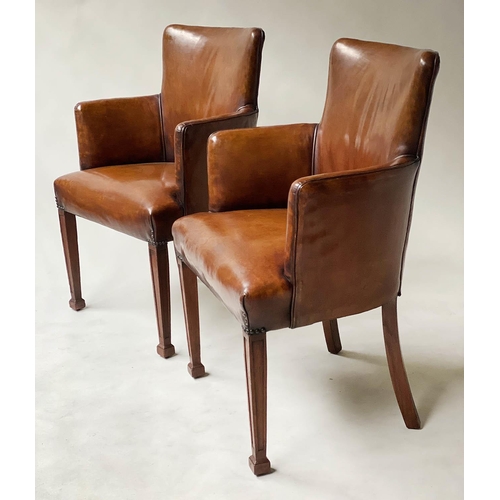 607 - TUB ARMCHAIRS, a pair, Edwardian mahogany with brass studded hand dyed piped mid tan leather with ta... 